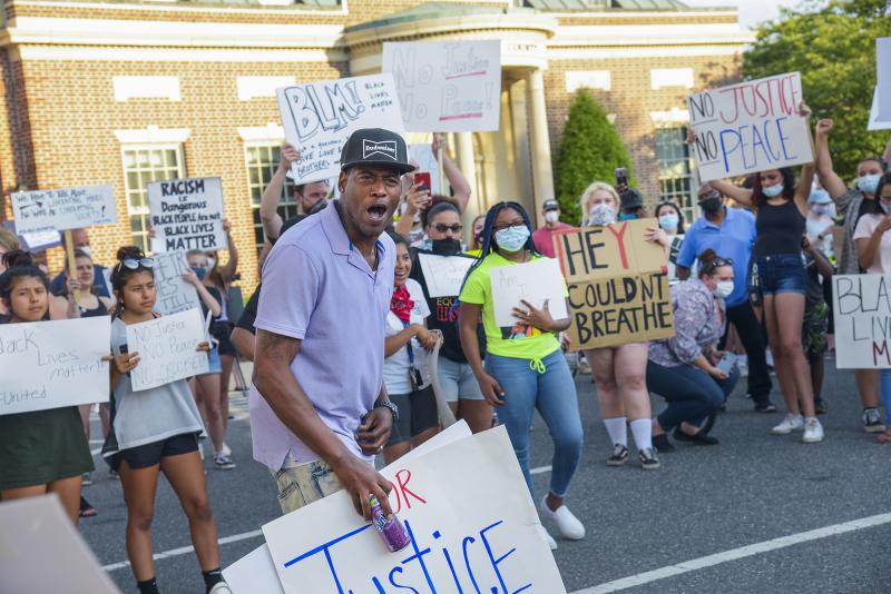 Lawrence Walston gives a stirring chant to close the rally, “What do you want?” And the crowd responds, “Justice!” “When do you want it?” “NOW!”